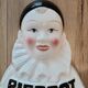 Présentoir à sucettes publicitaire buste pierrot gourmand en porcelaine