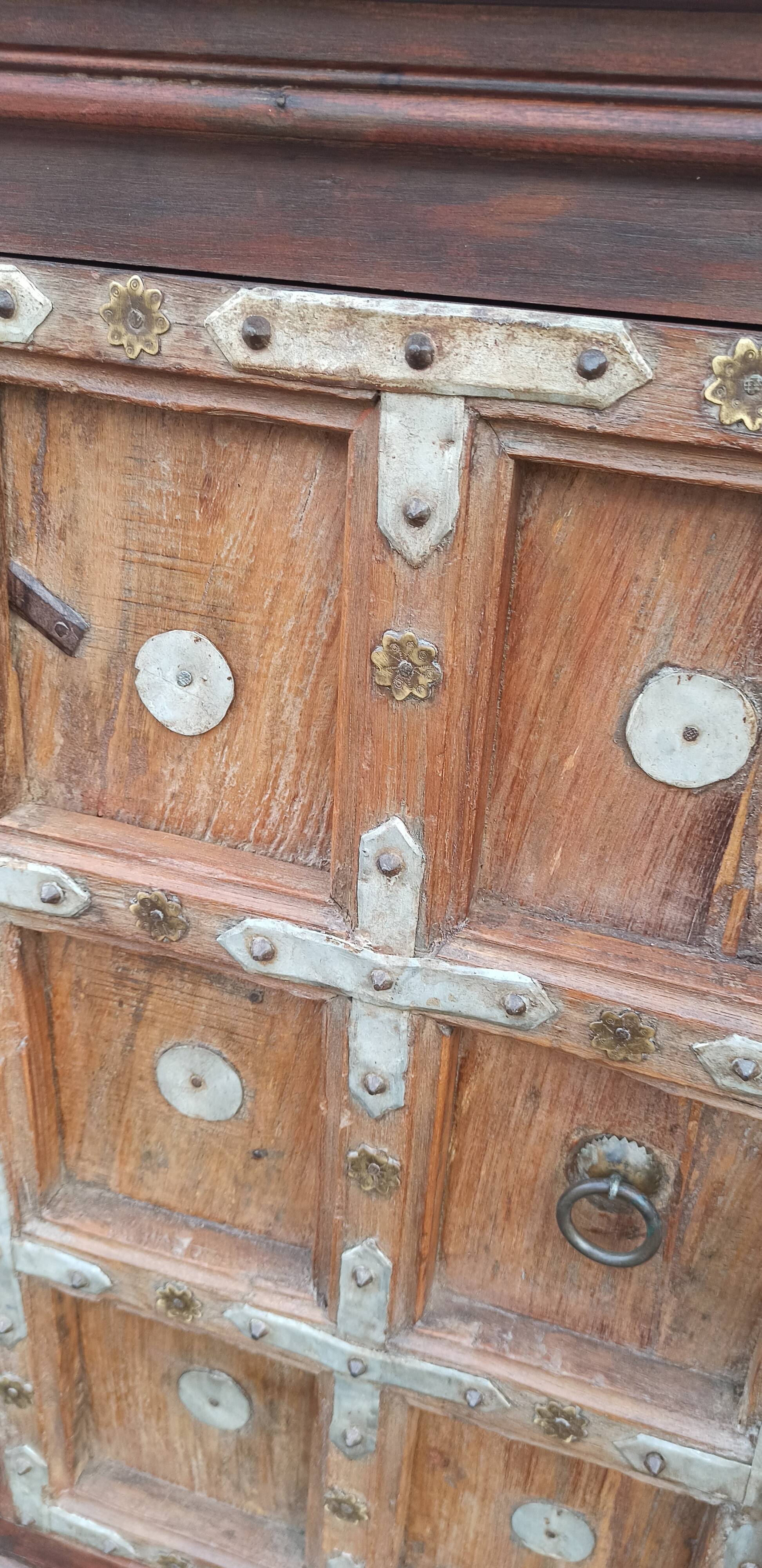 Small old wooden sideboard with two doors