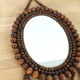 Miroir en perles 1970  22x60cm