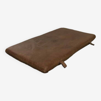 Old leather gymnastics mat