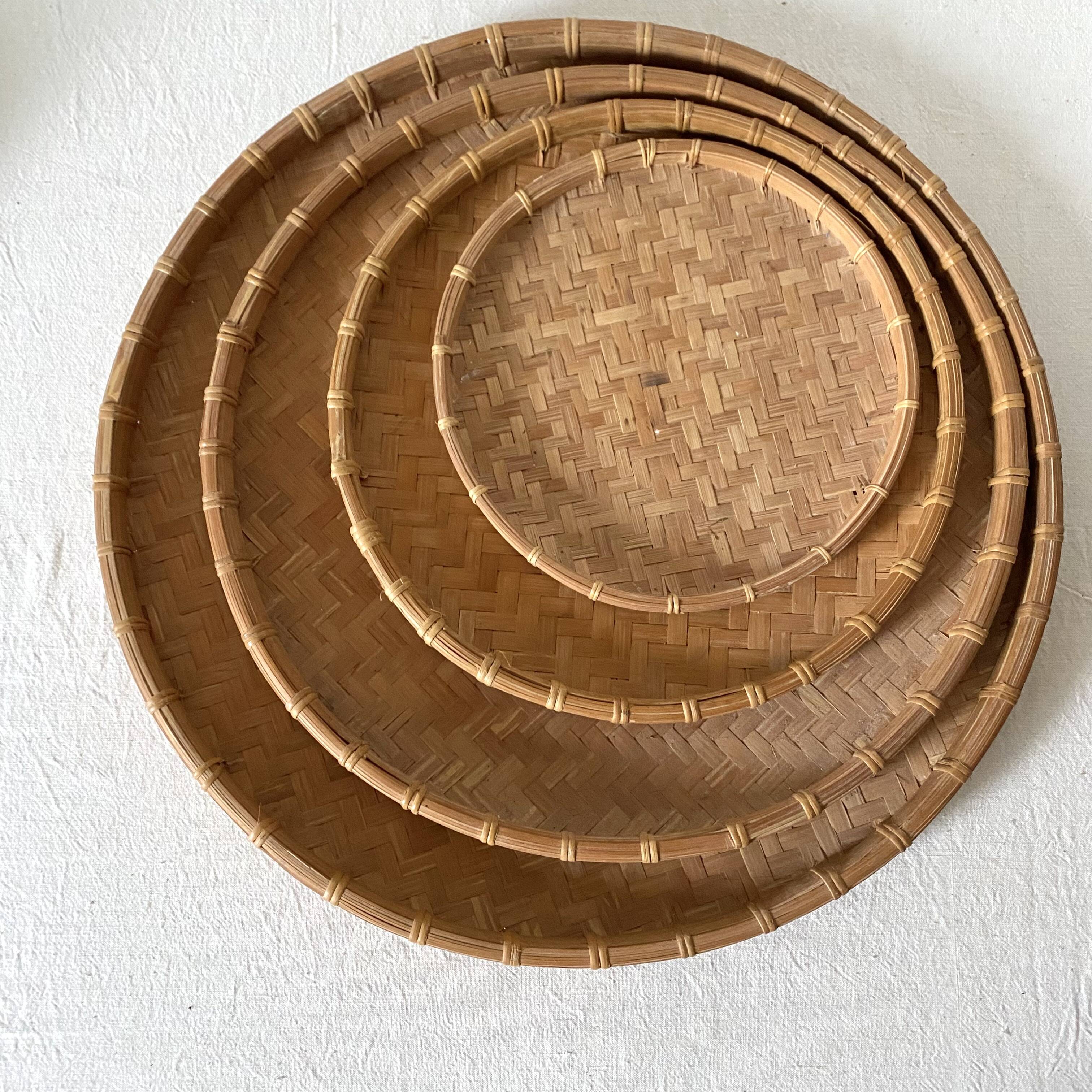Round nesting trays in woven bamboo