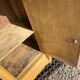 Yellow painted wooden bedside table