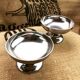 Lot de douze coupes anciennes en inox