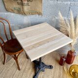 Bistro table in wood and cast iron