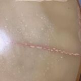 Vintage round coffee table: onyx top & gold brass structure