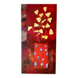 Golden flowers in a polka dot vase