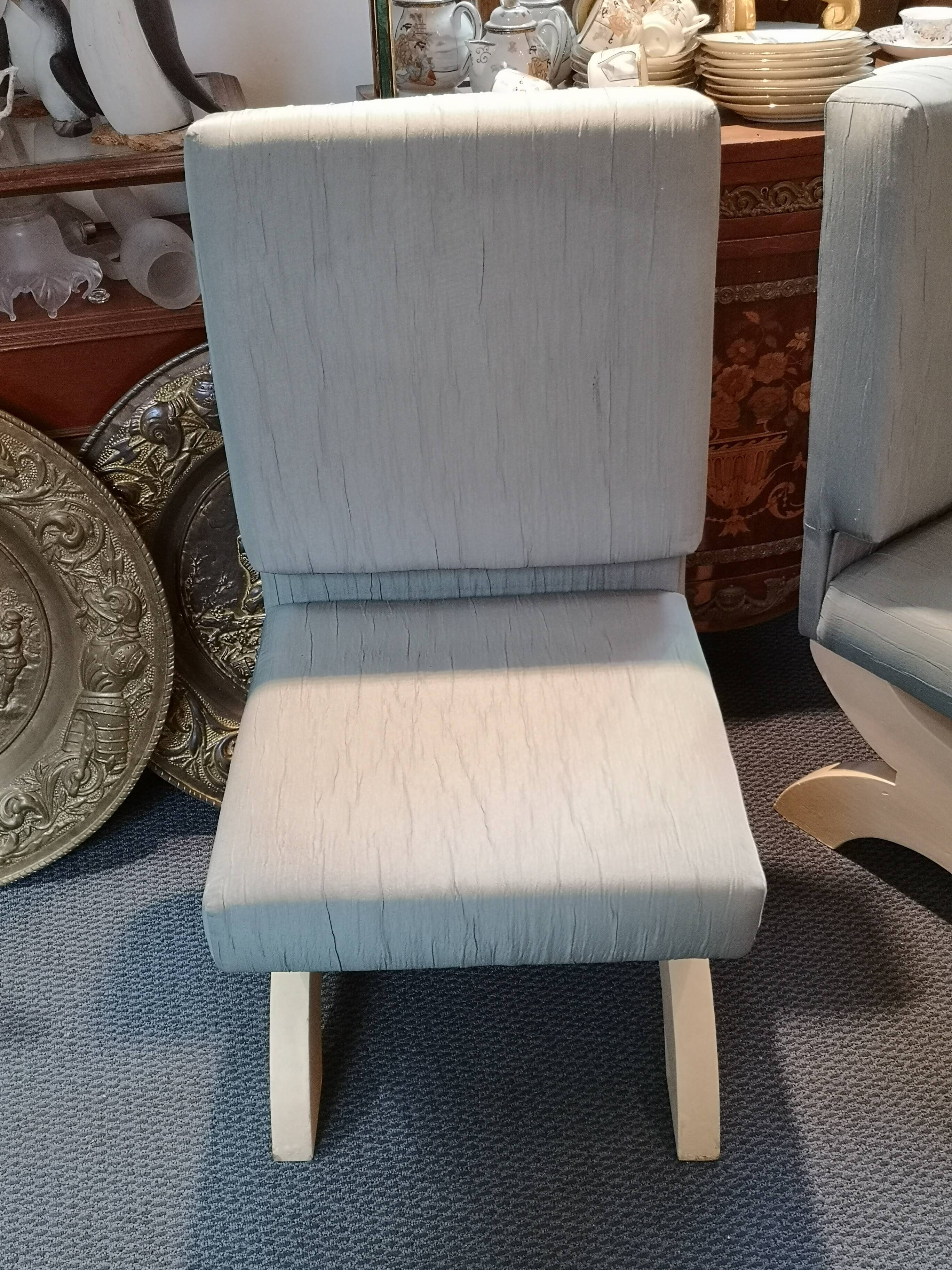 Pair of minimalist white and blue armchairs