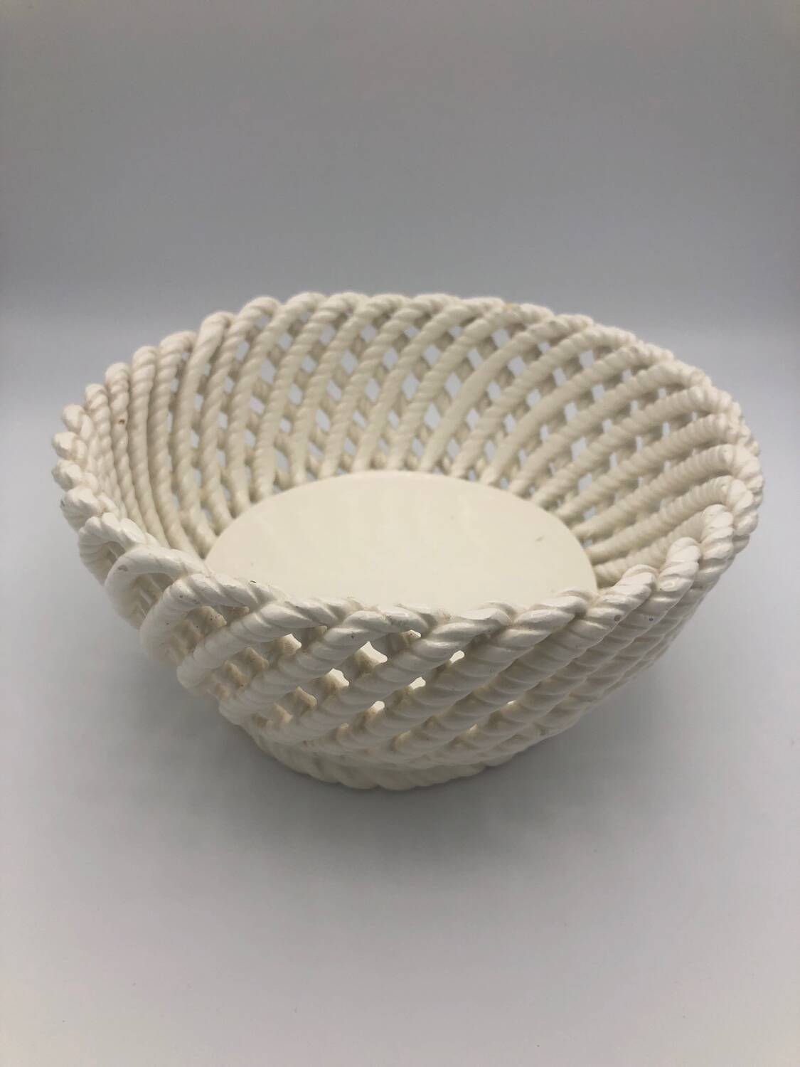 Woven ceramic basket