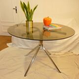 Table vintage 70 en verre légèrement fumé pieds chromés
