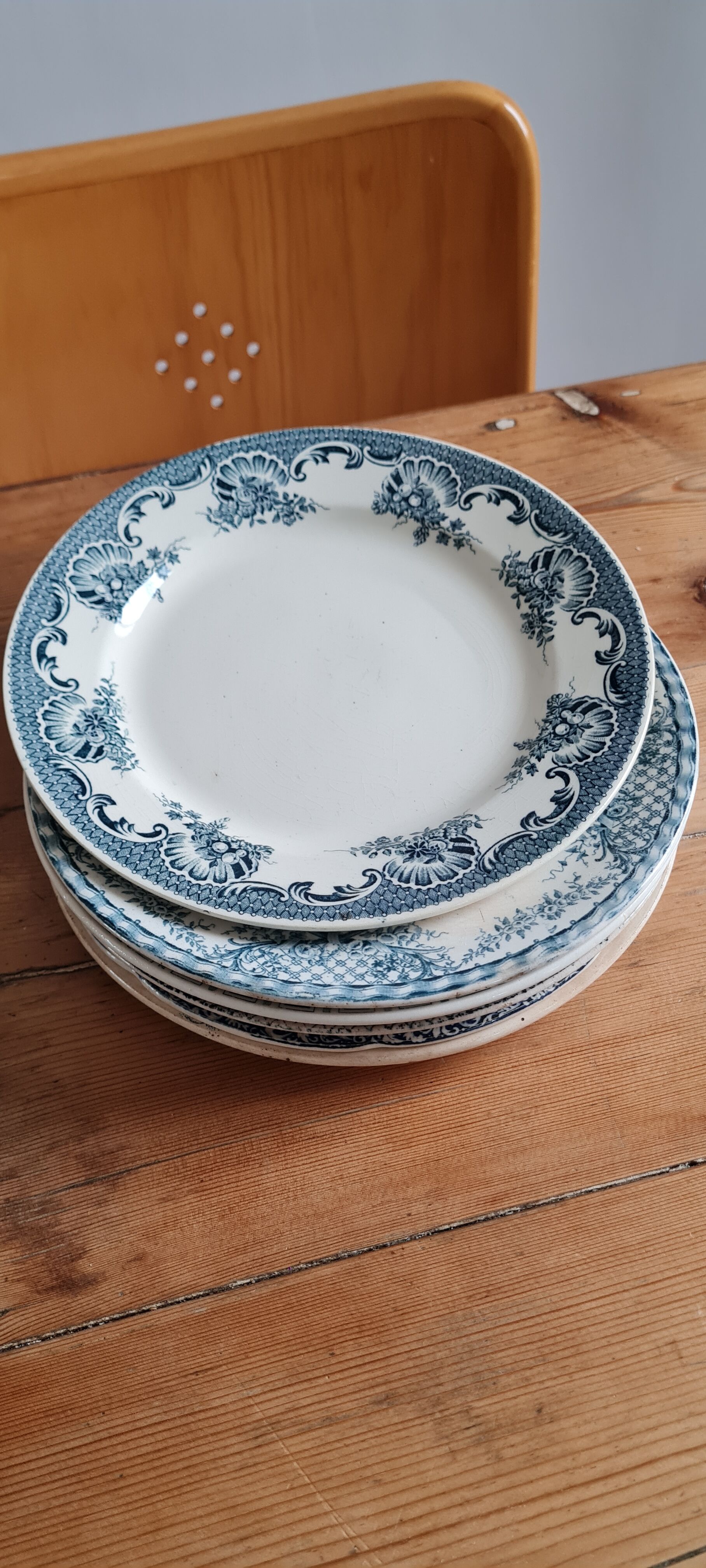 Set of 7 mismatched plates in iron earth