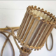 Pair of Louis Sognot rattan sconces