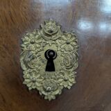Restoration period chest of drawers with bronze ornaments