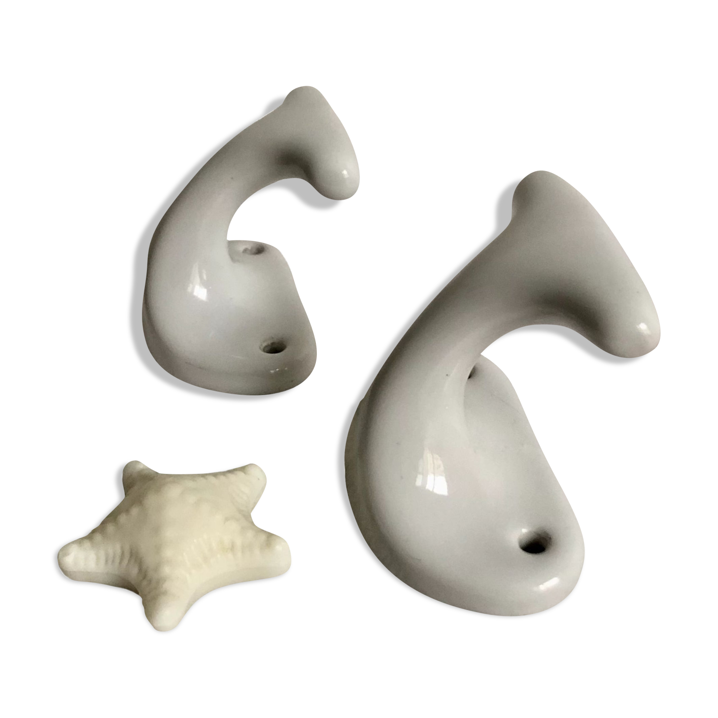 Pair of white porcelain hooks