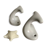 Pair of white porcelain hooks