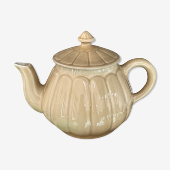 Beige earthenware teapot