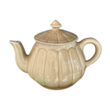 Beige earthenware teapot