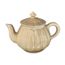 Beige earthenware teapot
