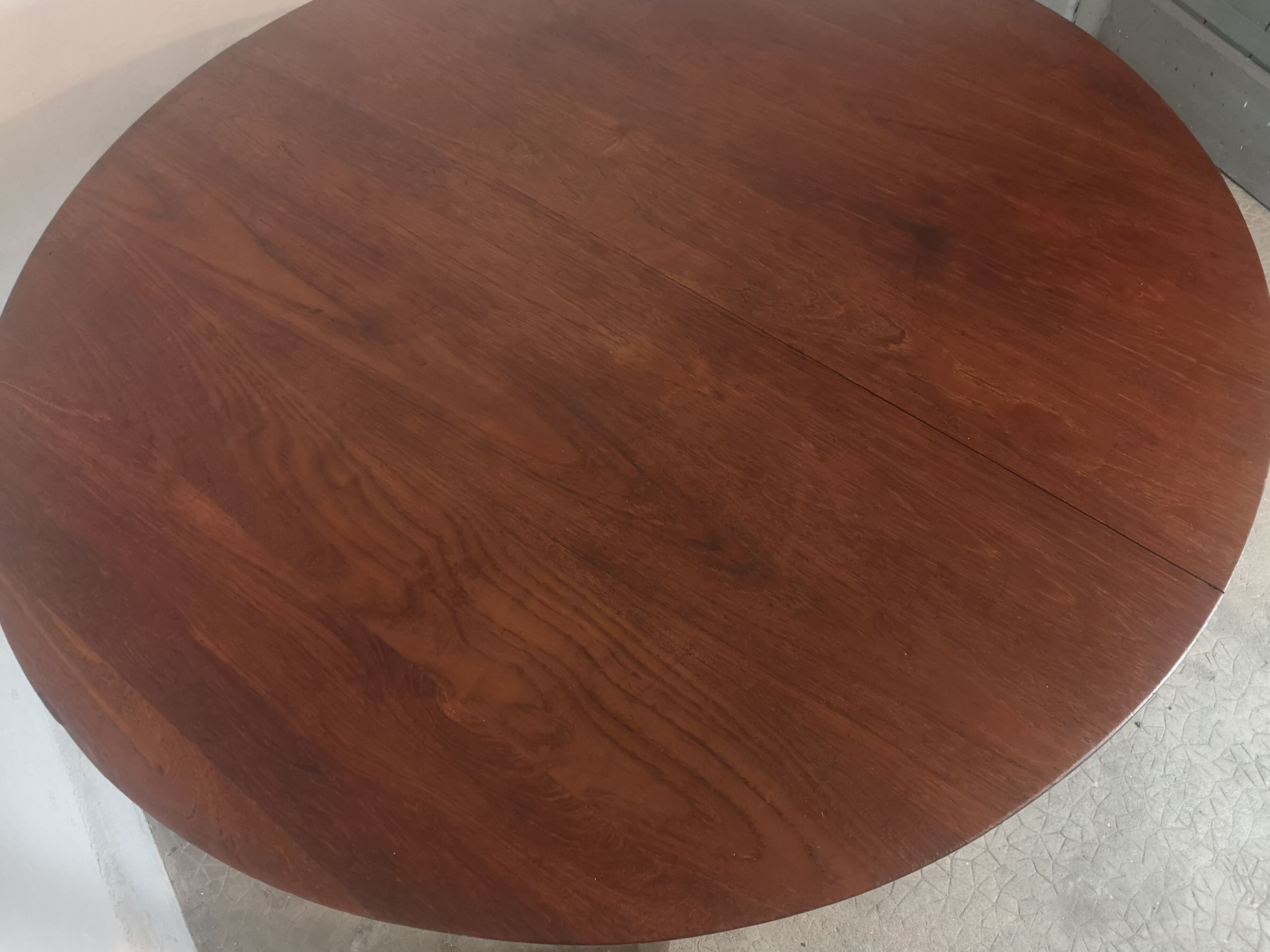 Scandinavian extendable round dining table in teak