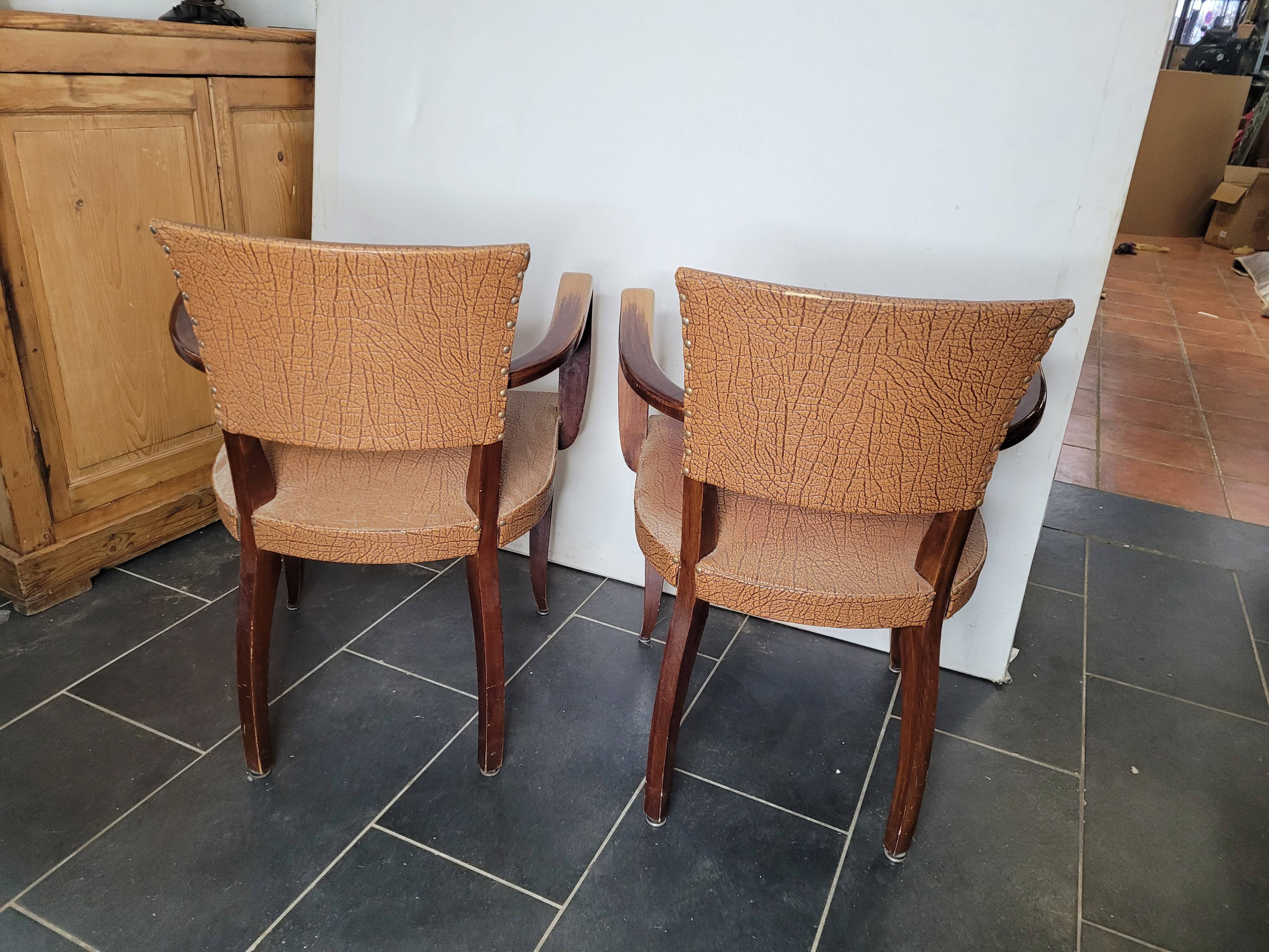 Pair of skai bridge armchairs