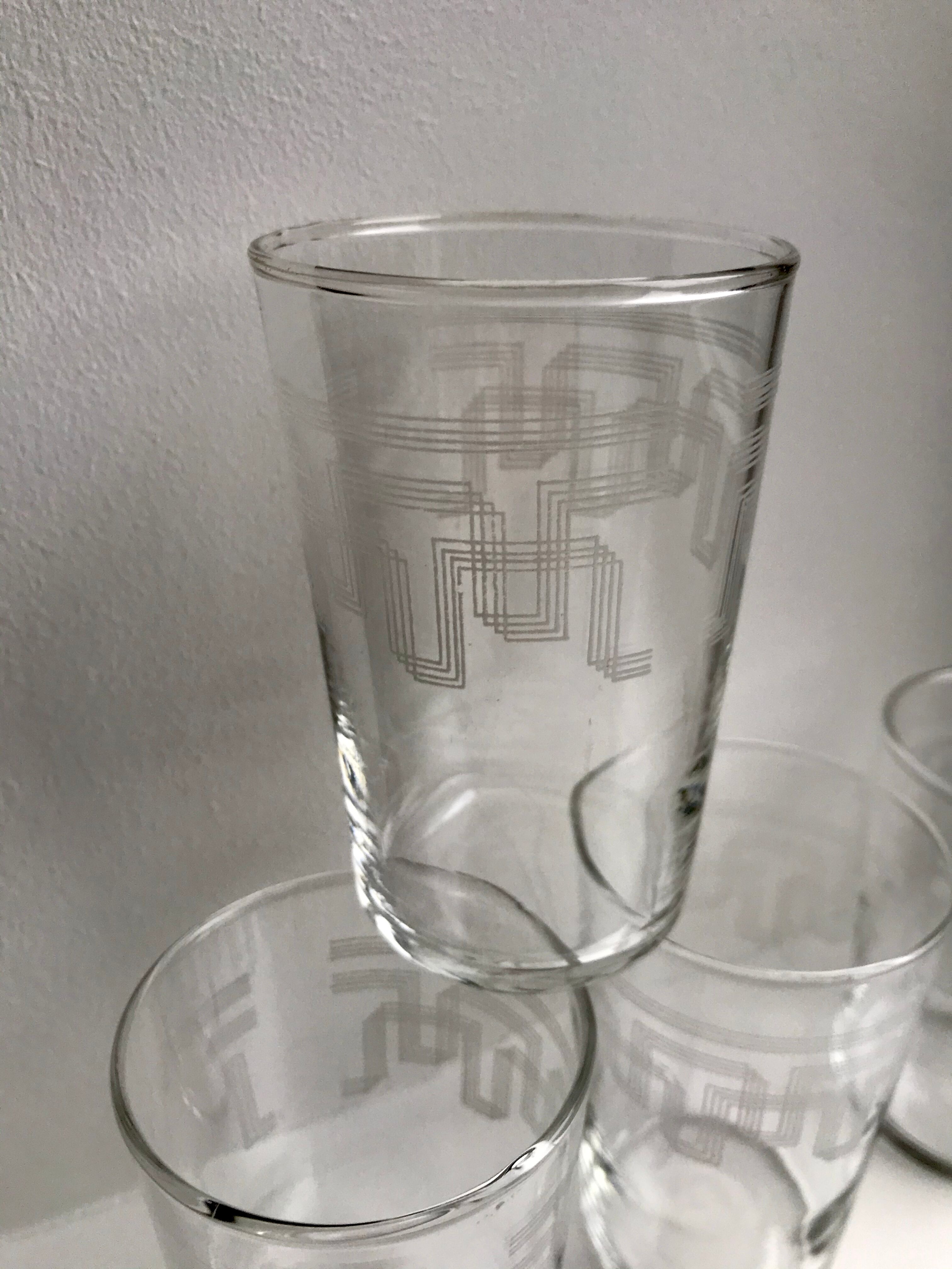 Set of 4 glass water glasses engraved years 50-60