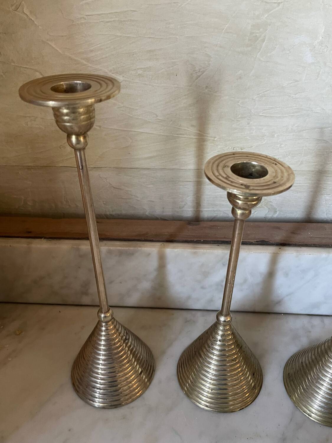 Set of three vintage brass candle holders