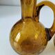 Duo of blown glass carafes – Biot signed – Bubbled amber glass