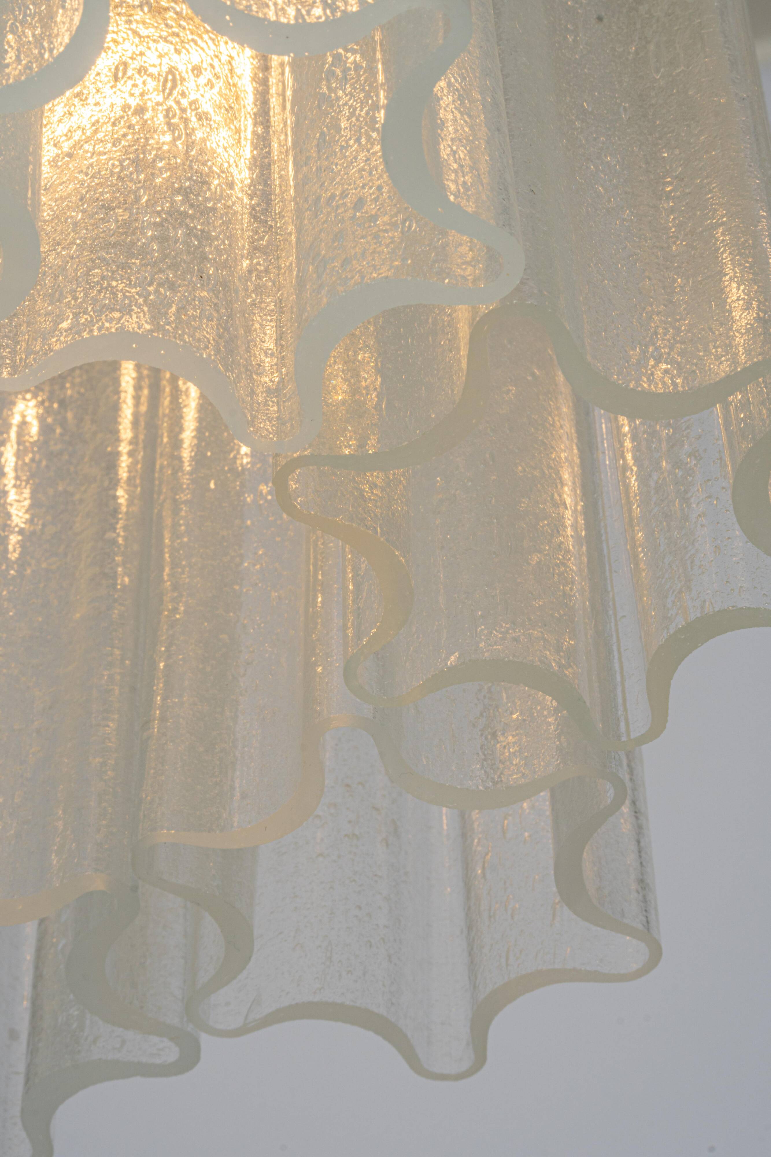 Pendant light with hand-blown glass pieces on a brass base made by Glashütte Limburg.