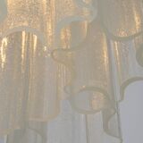 Pendant light with hand-blown glass pieces on a brass base made by Glashütte Limburg.