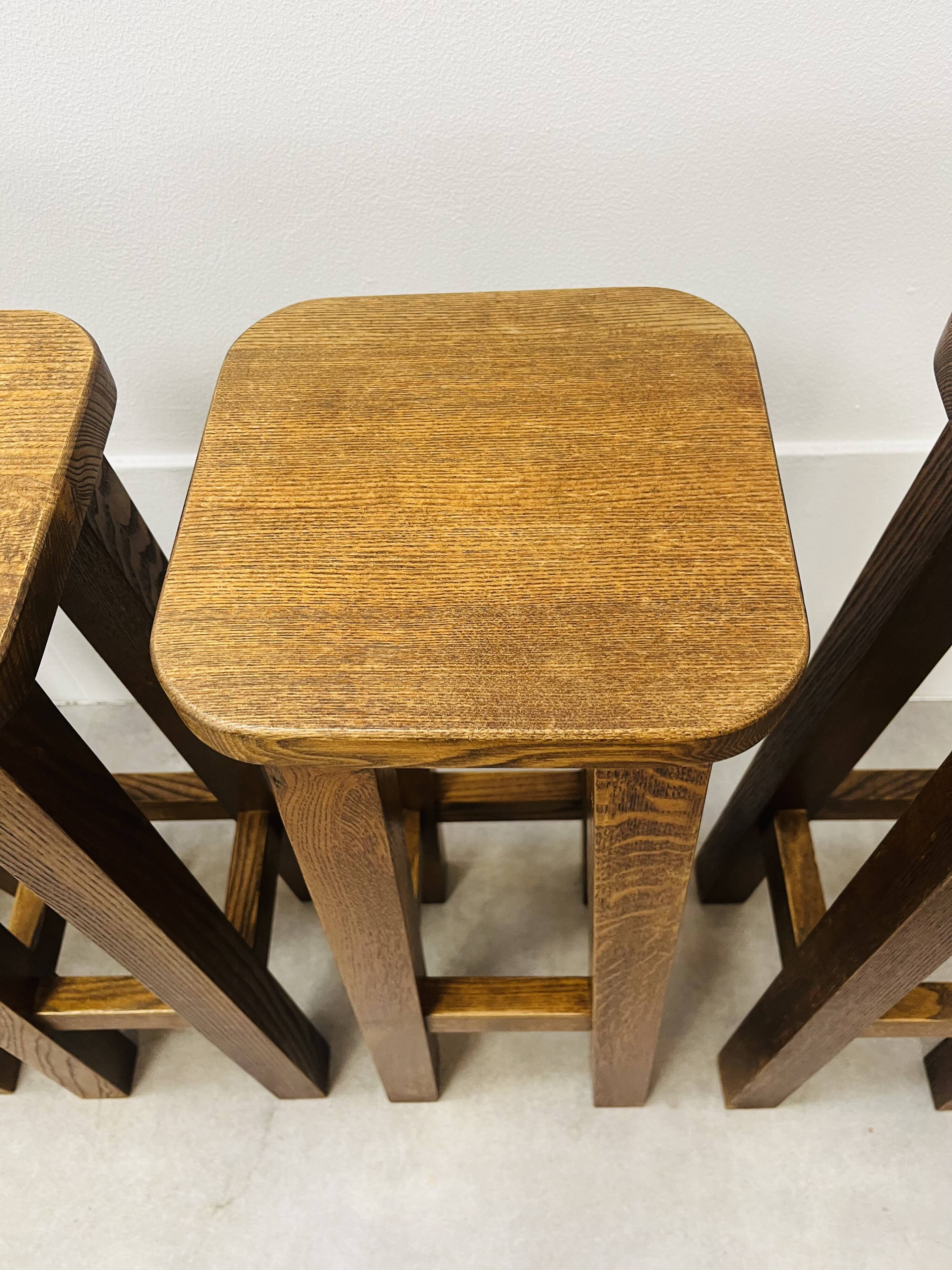 8 solid wood bar stools in brutalist style