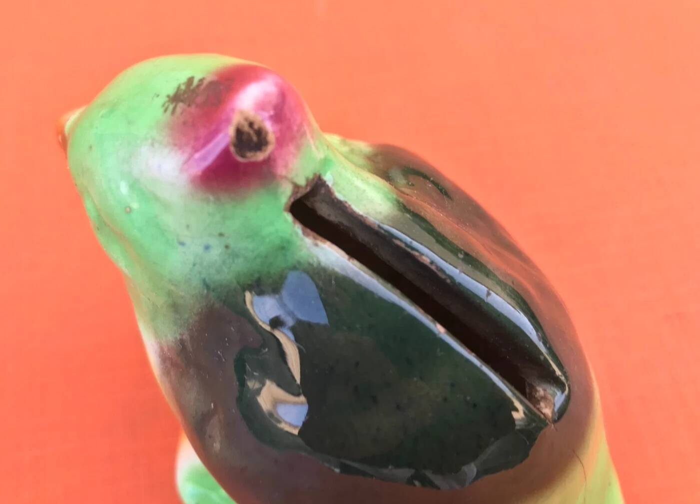 Polychrome ceramic parrot shape