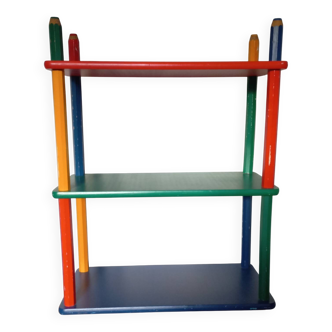 Shelf on legs, library, crayons in 4 colours.