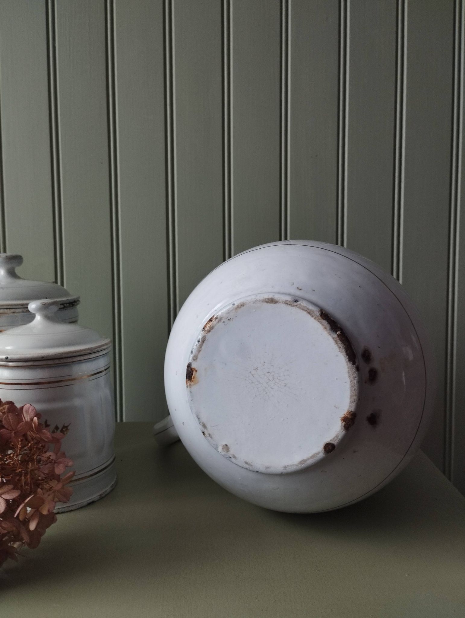 Rare large, pot-bellied toilet jug in white enamelled sheet metal with gold edging