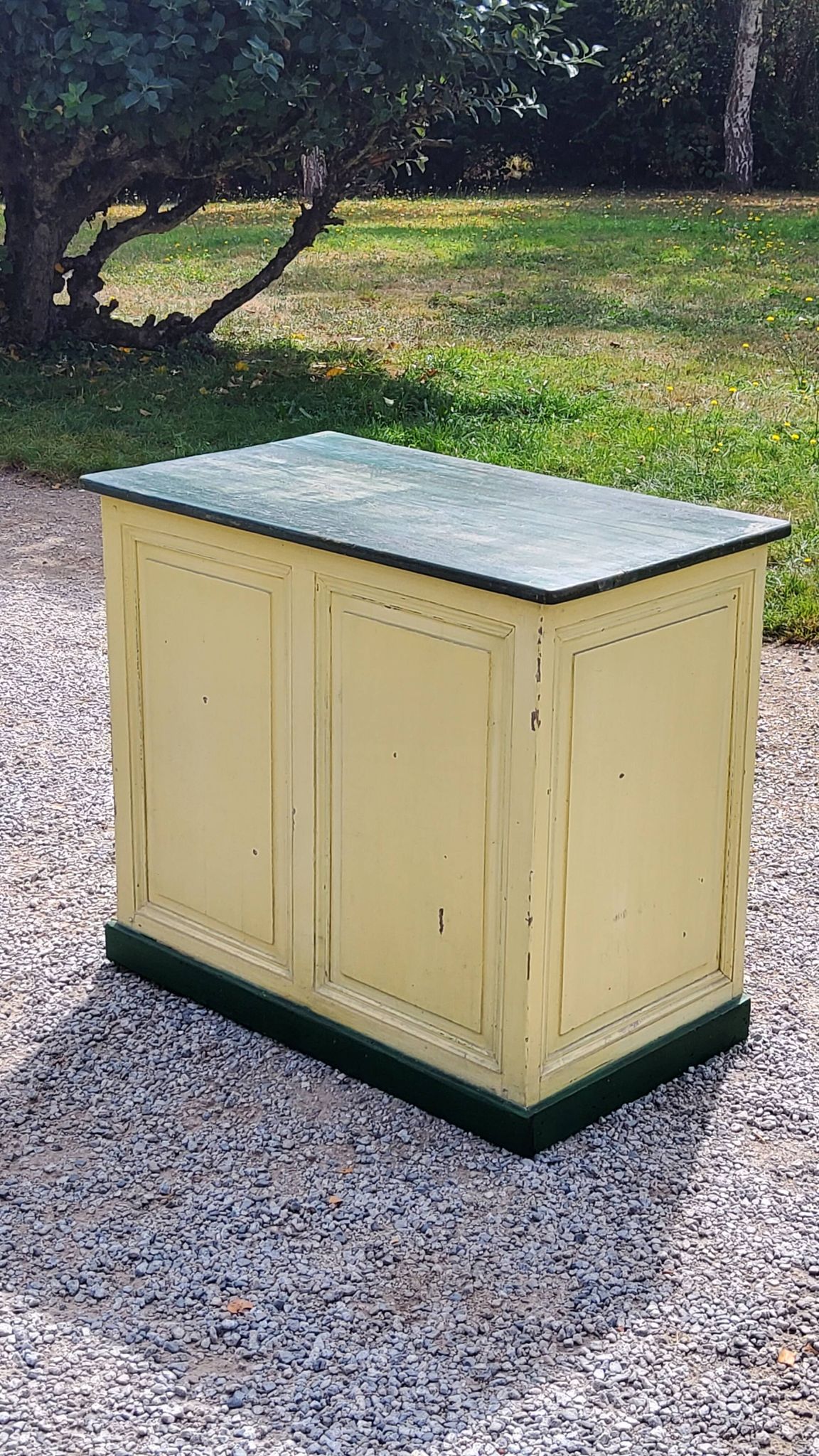 Late 19th century grocery counter in green and yellow patina painted wood
