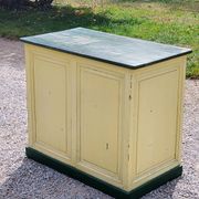 Late 19th century grocery counter in green and yellow patina painted wood