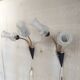 Articulated double light wall sconces in brass and glass - mid 20th century.