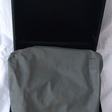 portable Remington typewriter with its suitcase and original cover