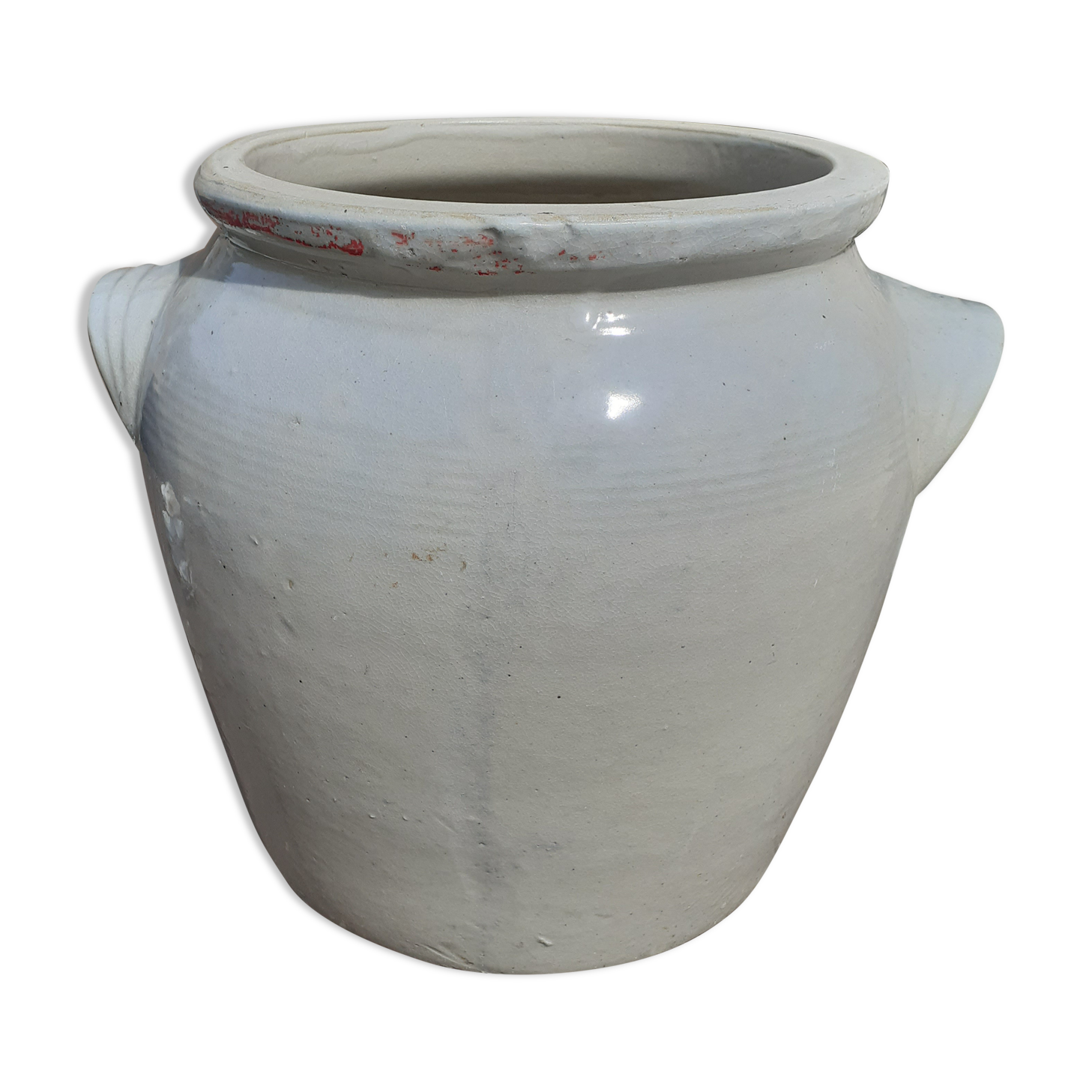 Old pot in beige sandstone.