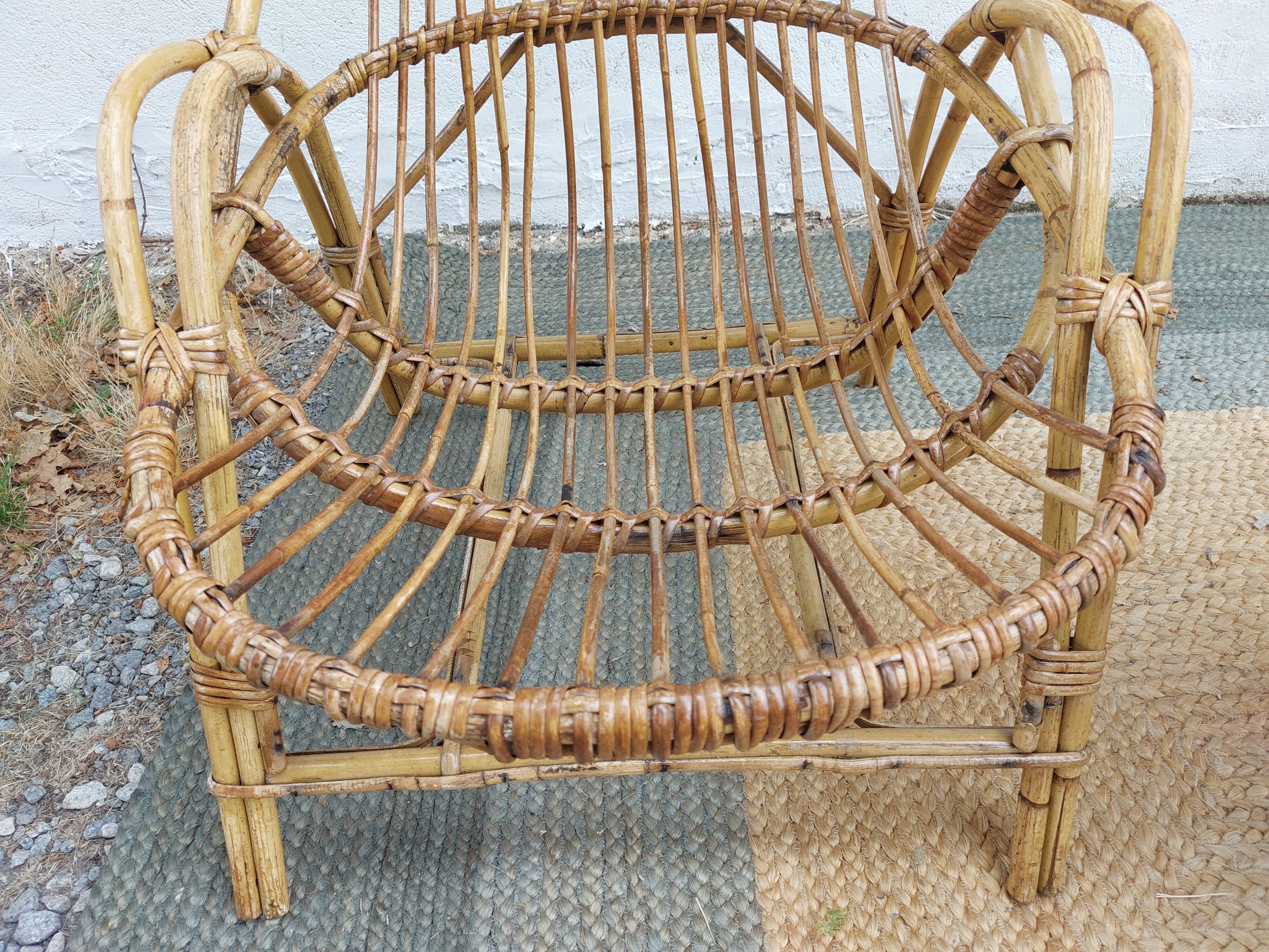 4 armchairs and a coffee table made of rattan and bamboo wood, vintage.