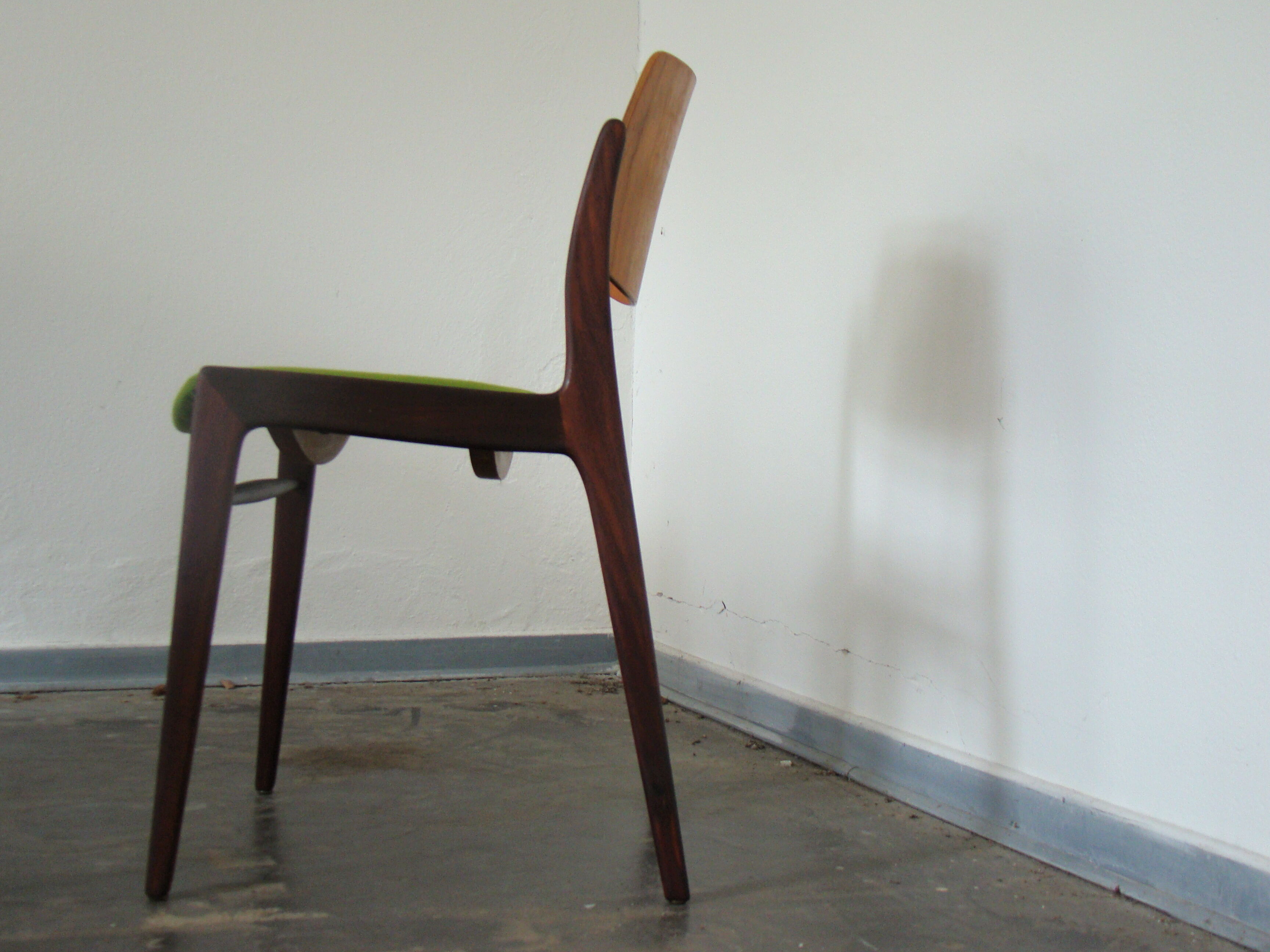 Two vintage teak dining chairs