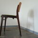 Two vintage teak dining chairs
