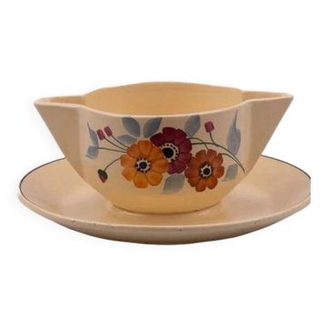 Vintage ceramic sauce boat from Saint-Amand in cream with floral patterns.