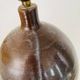 Pied de lampe en céramique et câble en tissu tressé