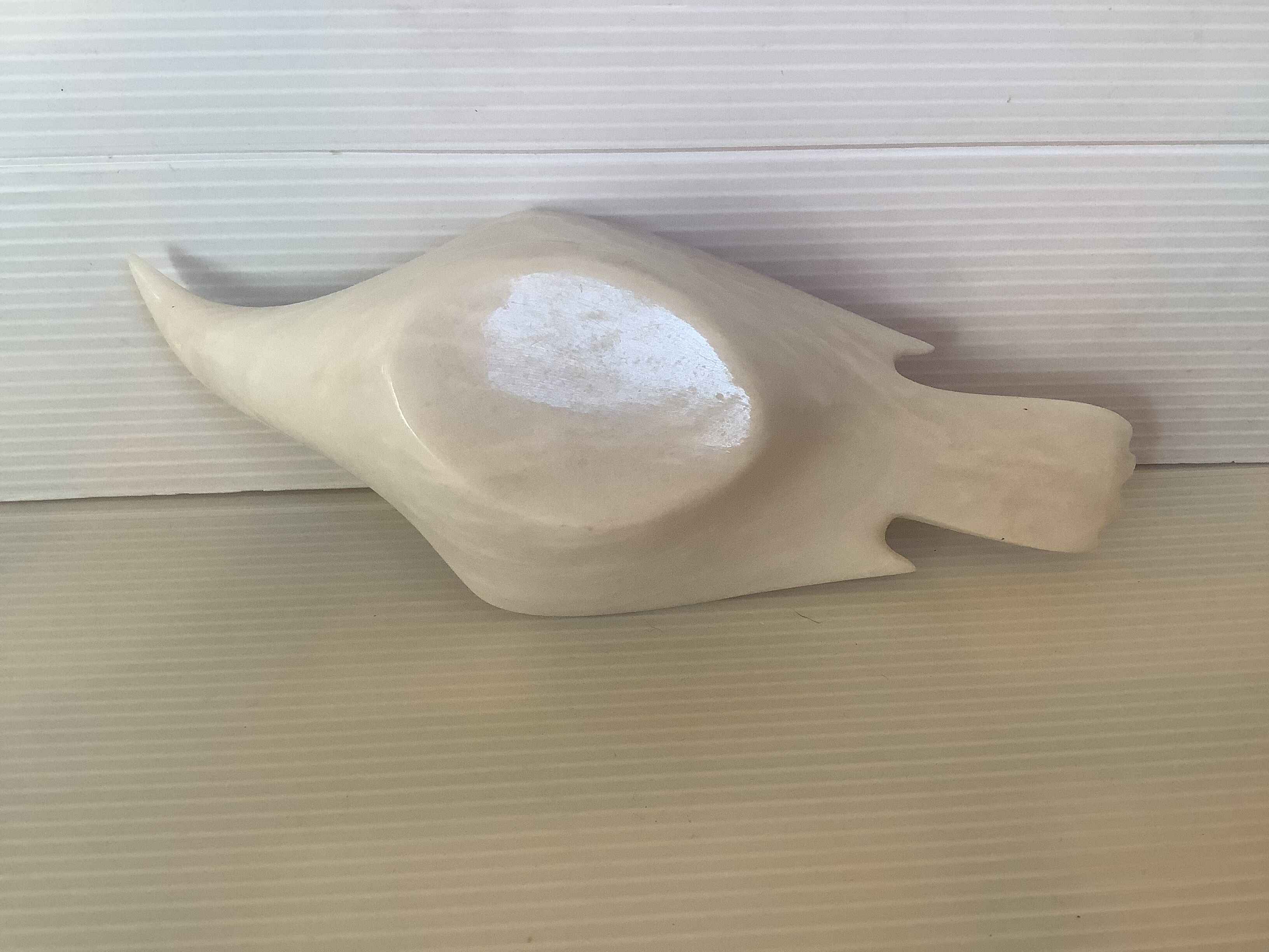 Marble bird empty pocket