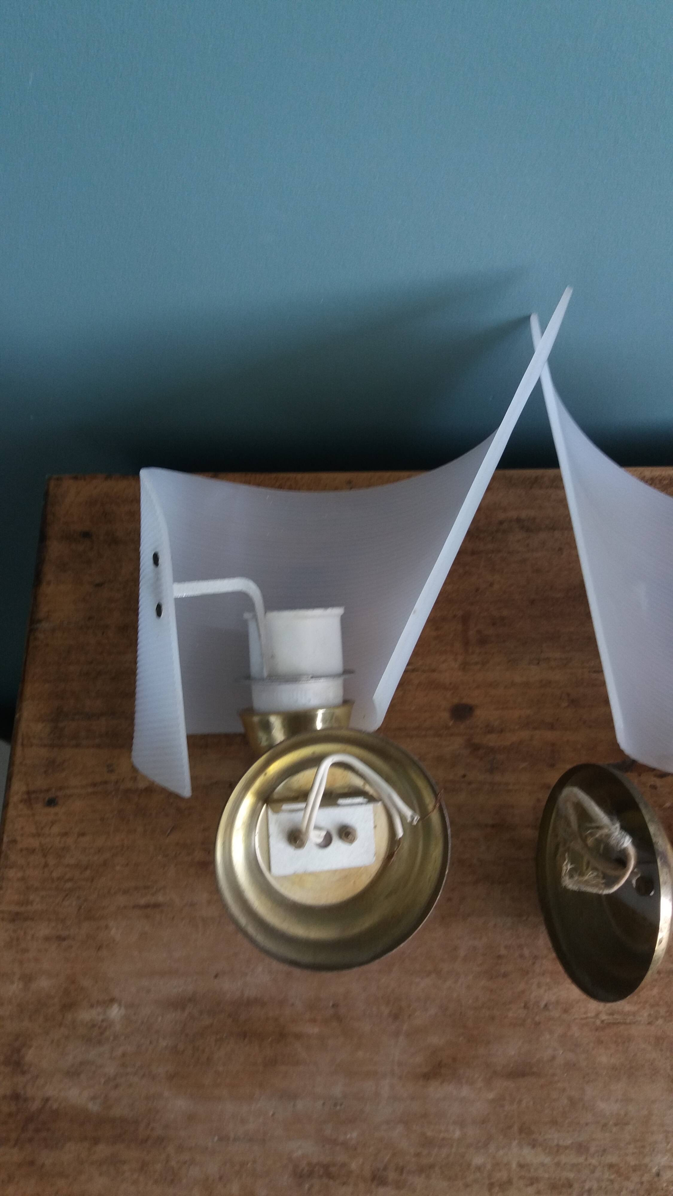 Golden metal appliques and plexiglass perspex in the style of Maison Lunel or Guariche.