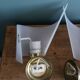 Golden metal appliques and plexiglass perspex in the style of Maison Lunel or Guariche.