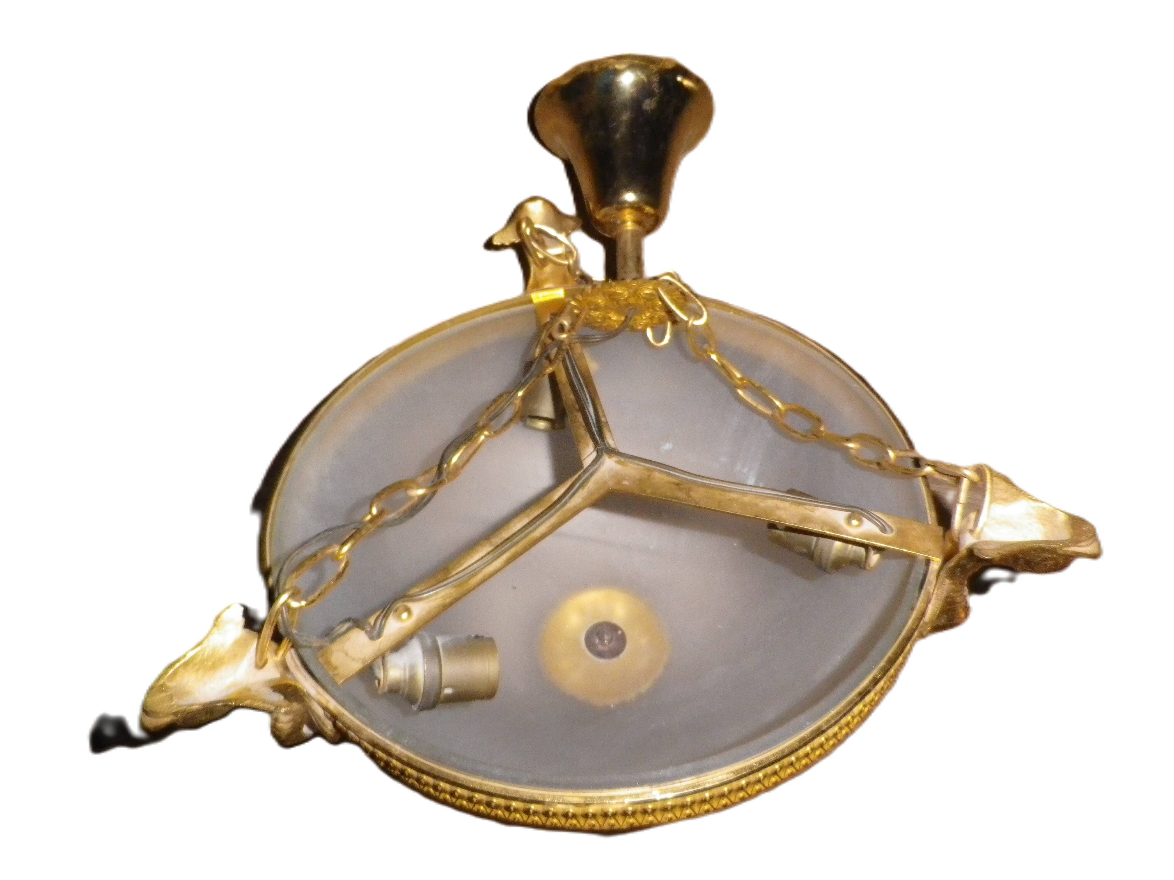 chandelier and its golden bronze brass wall lights