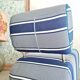 Curved armchair with blue and white stripes