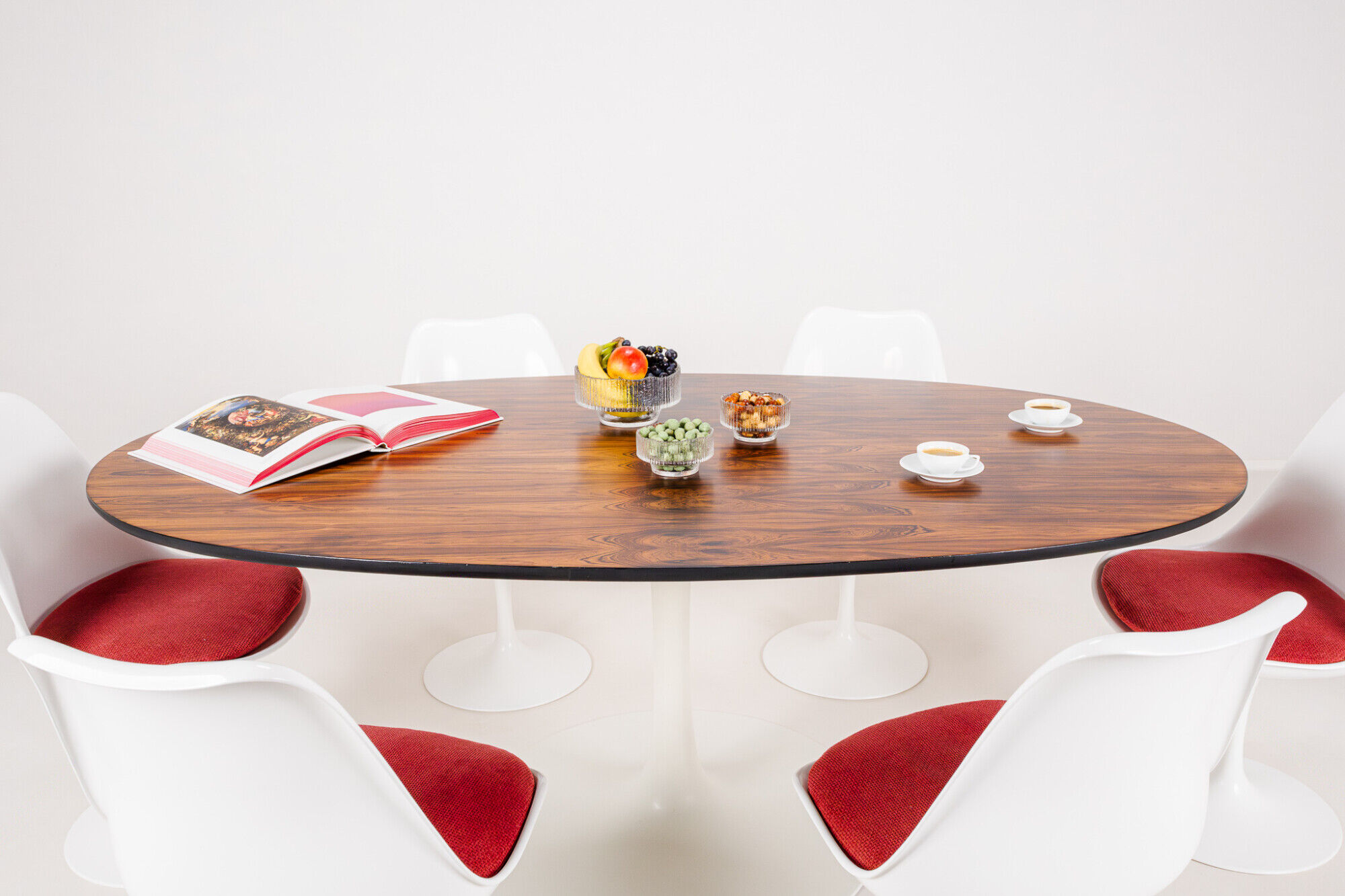Oval dining table in rosewood by Maurice Burke for Arkana, England, 1960s