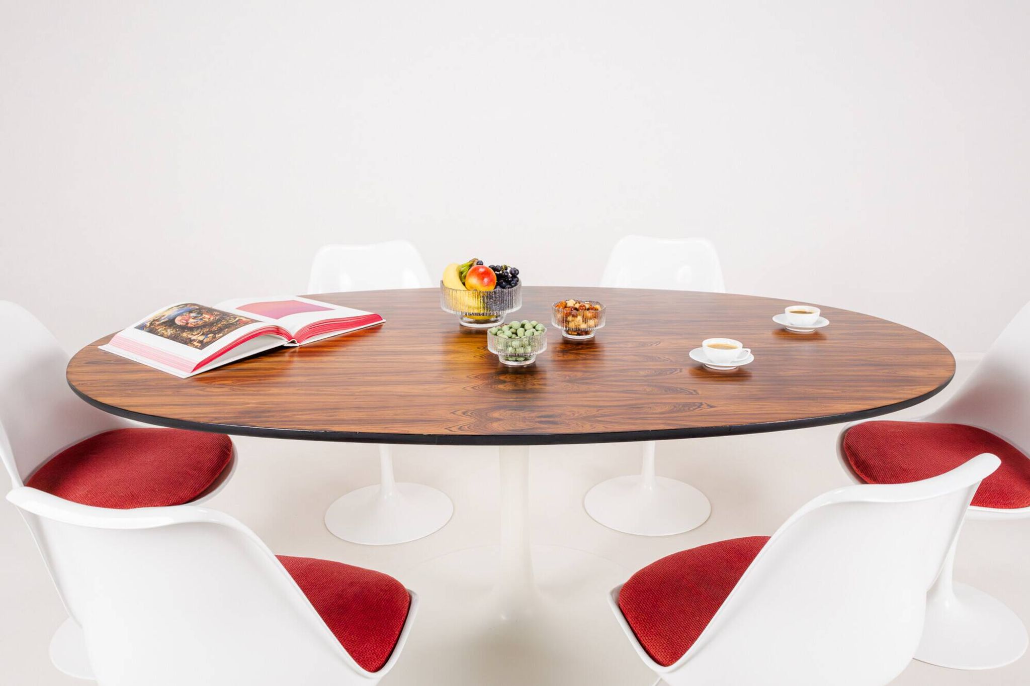 Oval dining table in rosewood by Maurice Burke for Arkana, England, 1960s