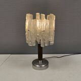 Table lamp with a teak ‘trunk’, silver-coloured metal base, acrylic shade